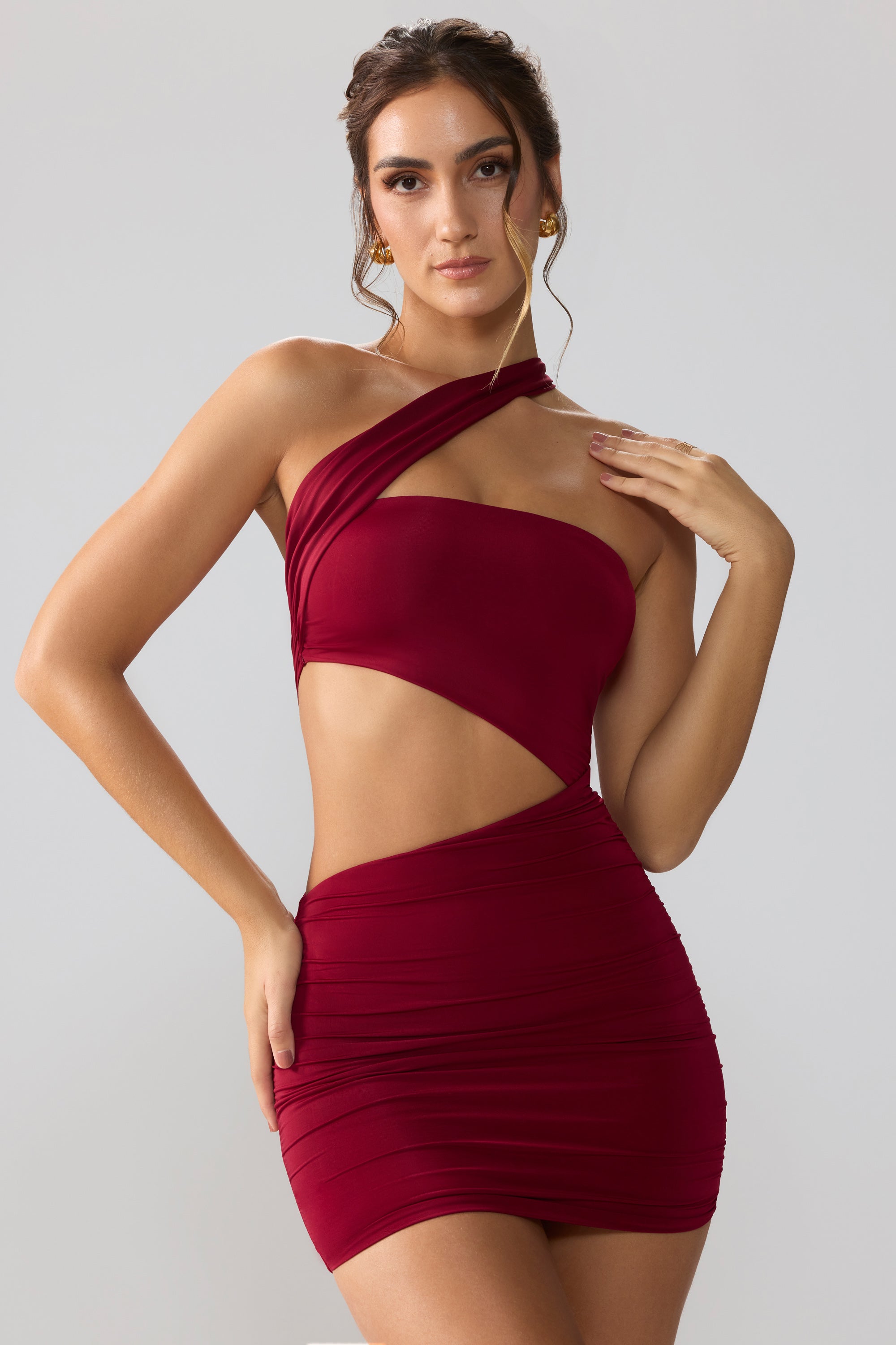Shyla Slinky Jersey Ruched Cut Out Mini Dress in Ruby