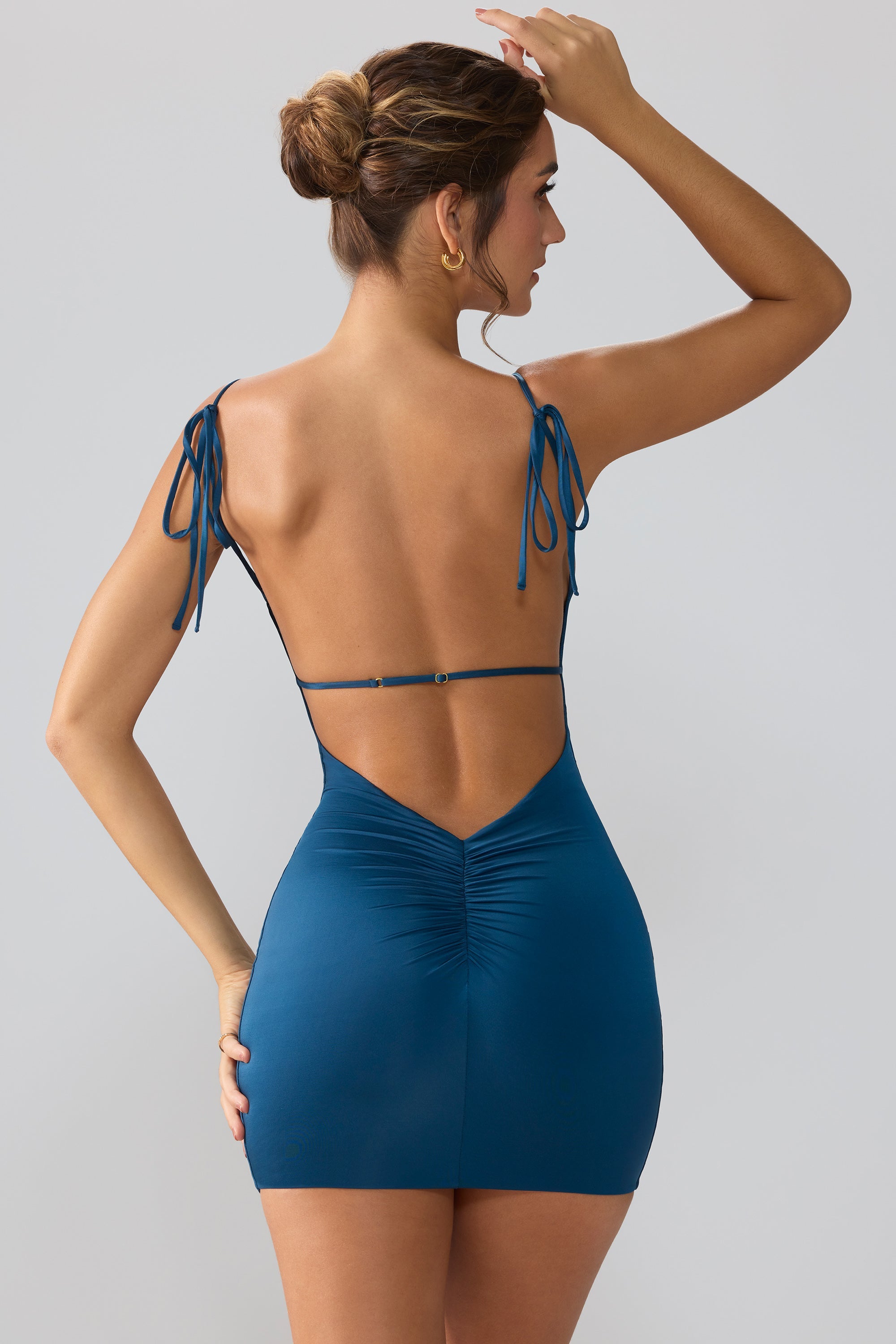 Orli Slinky Jersey Asymmetric Neckline Open Back Mini Dress in Midnight Blue